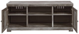 Wynnlow Gray 63 inch TV Stand close-up of crossbuck door detail