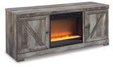Wynnlow rustic gray TV stand close-up on crossbuck detailing