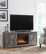 Electric fireplace insert lit inside Wynnlow TV stand