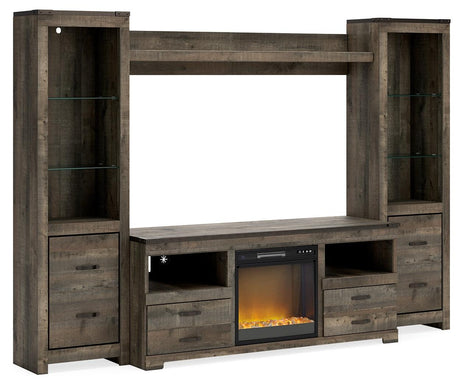 Trinell Brown 4-Piece Entertainment Center with Electric Fireplace - full view showing tall piers and TV stand