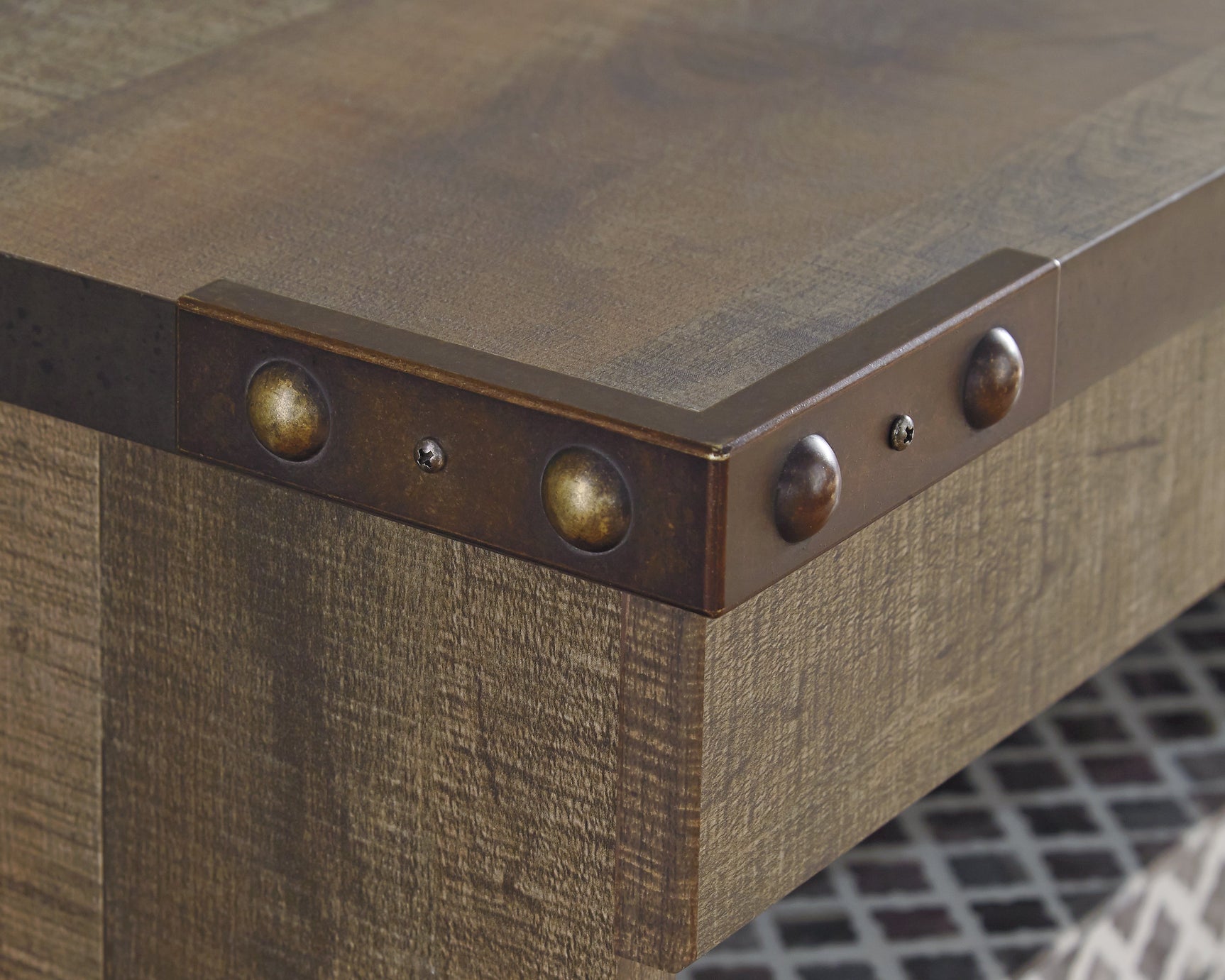 Antiqued bronze hardware and plank finish detail