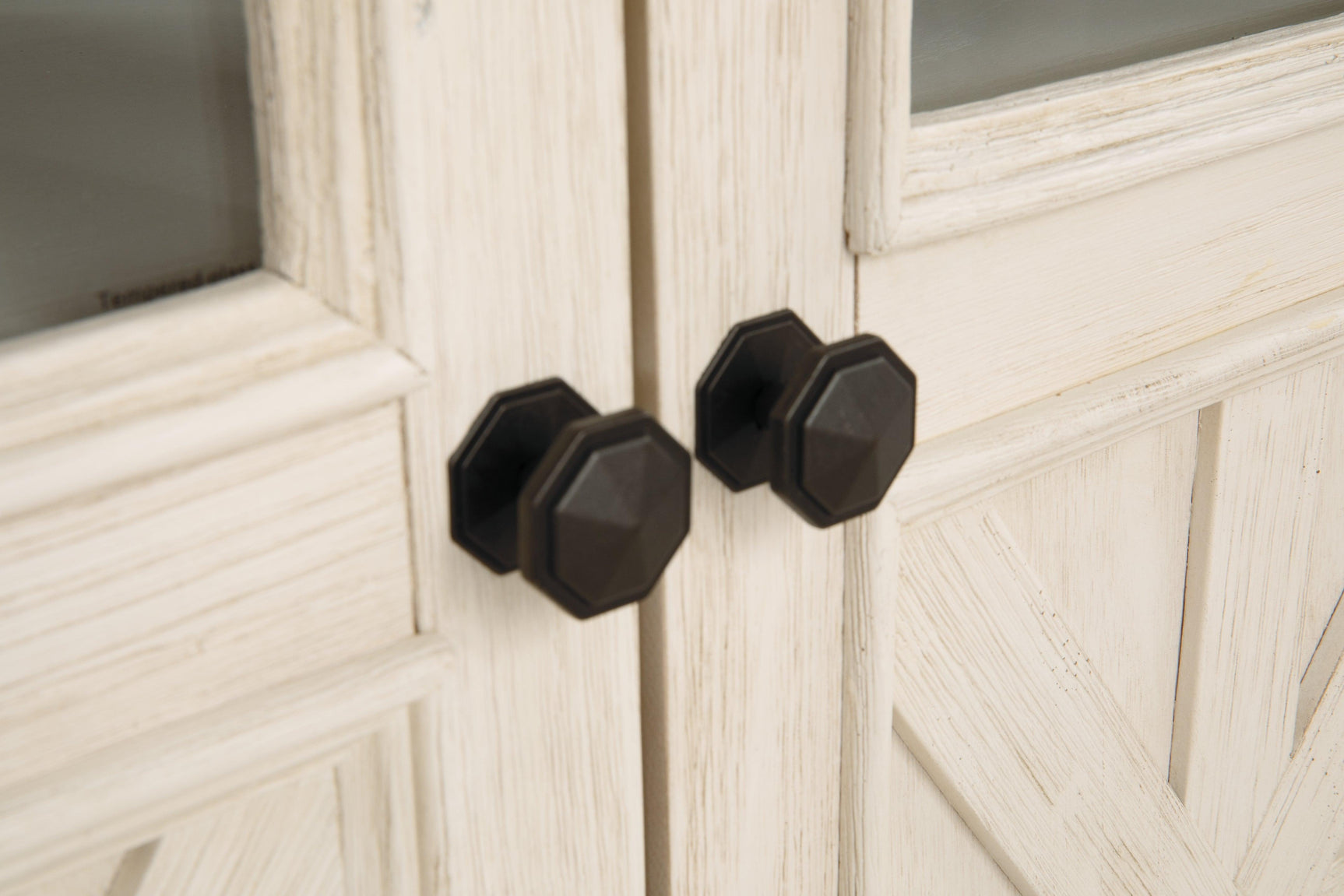 Bolanburg Two-tone 74 inch TV Stand crossbuck door detail