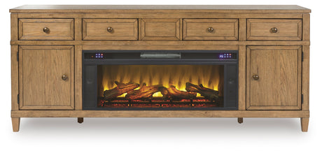 Close-up of electric fireplace insert with glowing embers