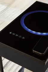 Top view of wireless speaker integration in glass tabletop