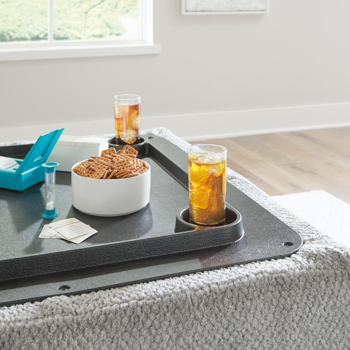 Casselbury Cement 2-Piece Sectional with Ottoman — detail view
