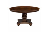 room view of Lordsburg brown cherry round dining table with six faux leather side chairs