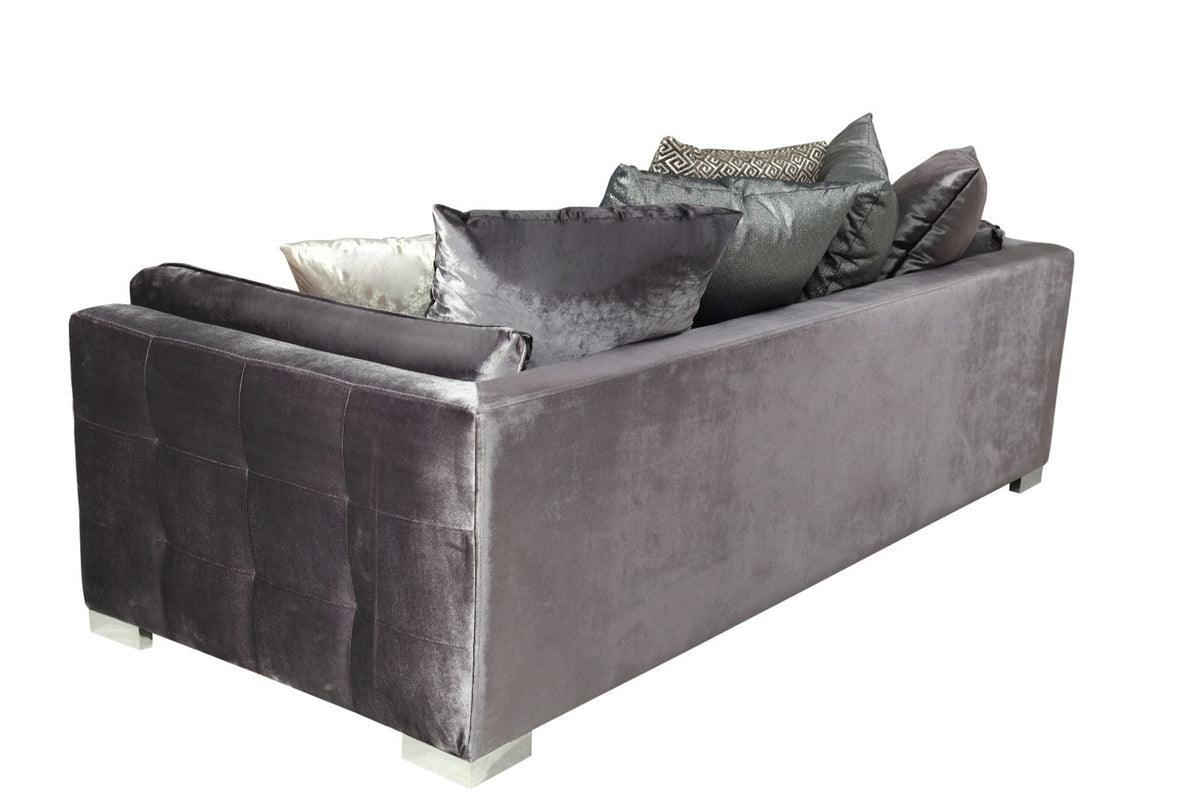 Side perspective of Skylar gray velvet sofa highlighting texture