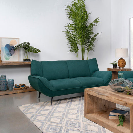 Side view of Acton teal blue loveseat