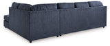 Close-up detail of cobalt fabric upholstery on sectional sofa