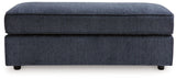 Albar Place cobalt ottoman showing chenille fabric texture