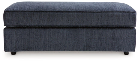 Albar Place cobalt ottoman showing chenille fabric texture
