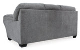 Detailed view of cushion stitching on sofa