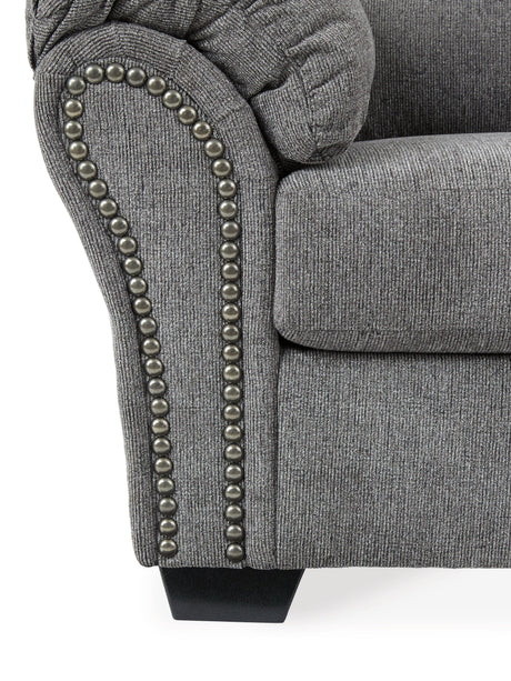 Full view of sofa and loveseat in room setting