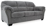 Armrest detail with black nickel-tone nailhead trim