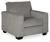 Side view of chair's track arms and ottoman