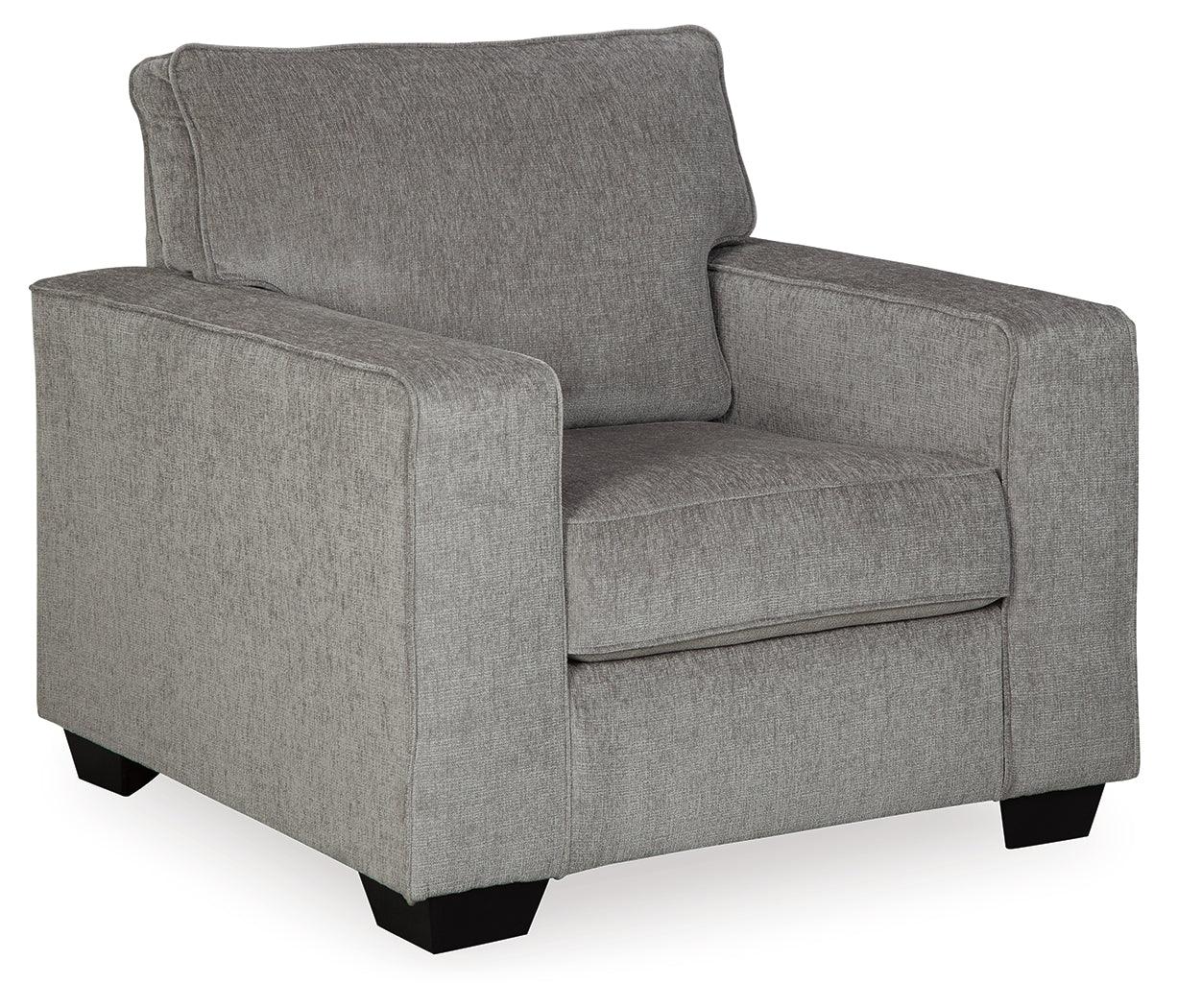 Side view of chair's track arms and ottoman