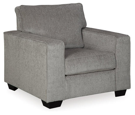 Side view of chair's track arms and ottoman
