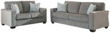Altari Alloy Sofa side view showing upholstery and frame