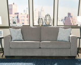 Detailed view of decorative pillows on Altari Alloy Sofa