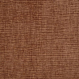 Close detail of sofa chaise arm and cushion