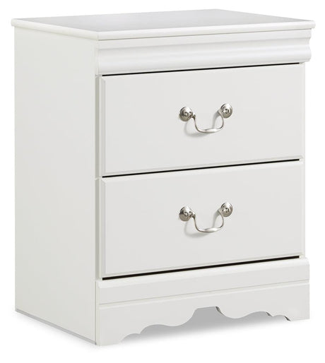 side view of white sleigh bed