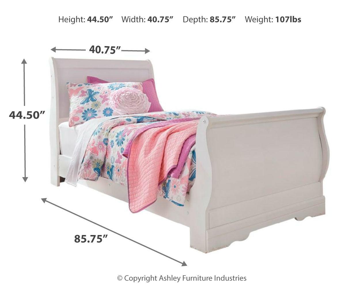 bedroom view of white sleigh bed