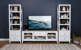 Angela TV stand with components and accessories organized