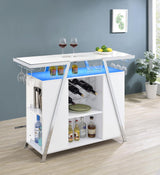 Top shelf of Araceli home bar with LED strip lighting on underside