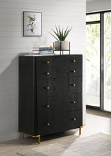 Close-up of gold metal knob and drawer detail