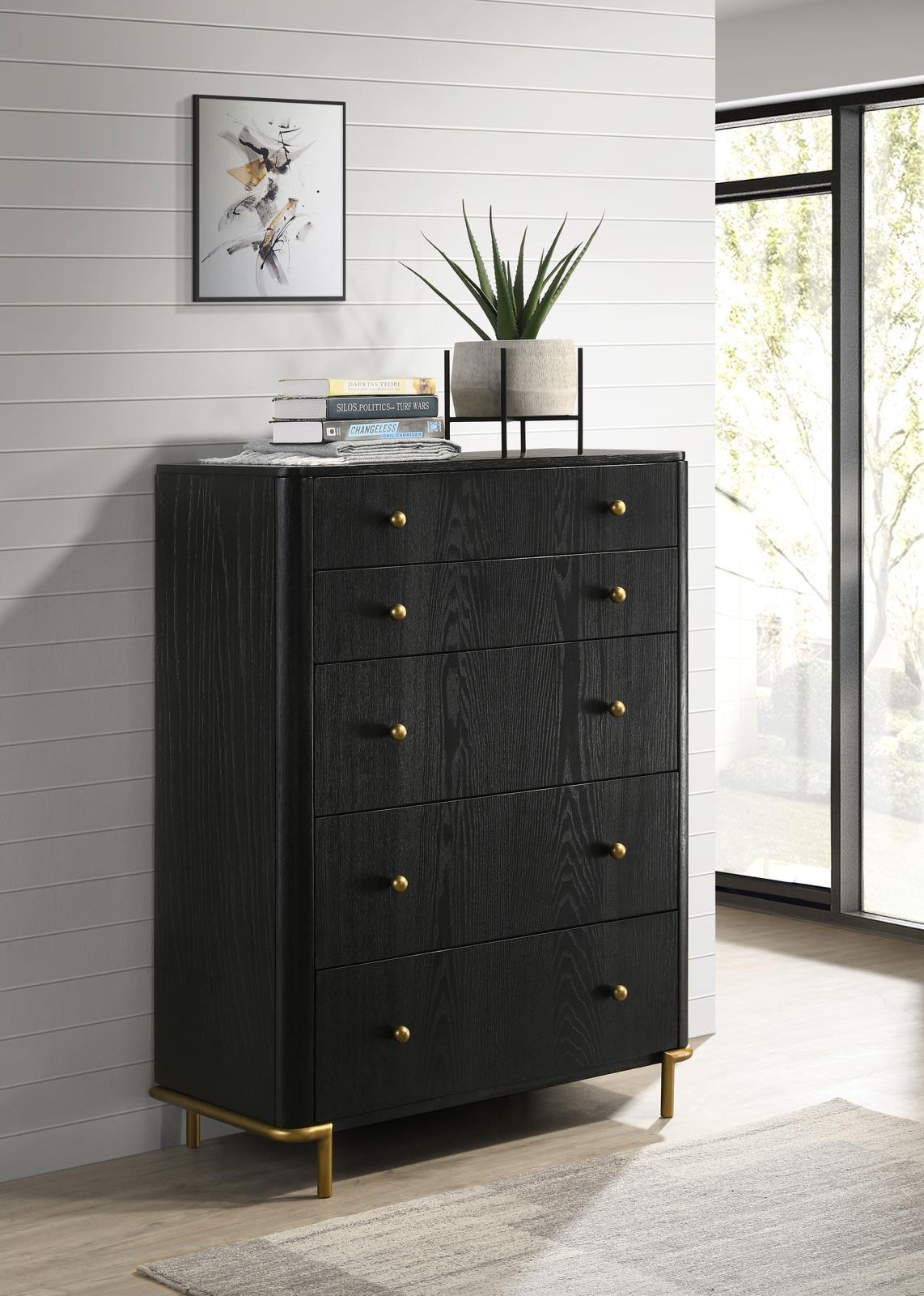 Close-up of gold metal knob and drawer detail