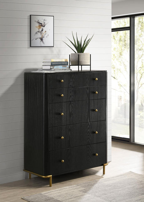 Close-up of gold metal knob and drawer detail