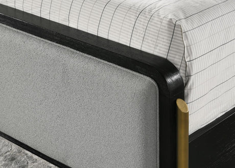 Arini Eastern King Bed displaying padded headboard texture