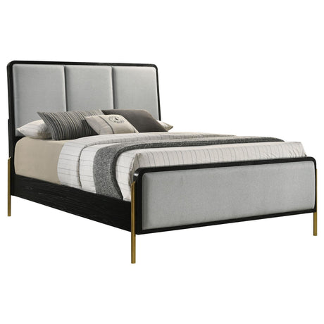 Side view of Arini Queen Bed highlighting padded grey upholstered headboard