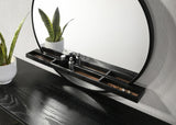 Arini round mirror on wall above dresser showing full size