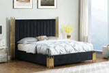 Close-up of upholstered black panel headboard with shelf