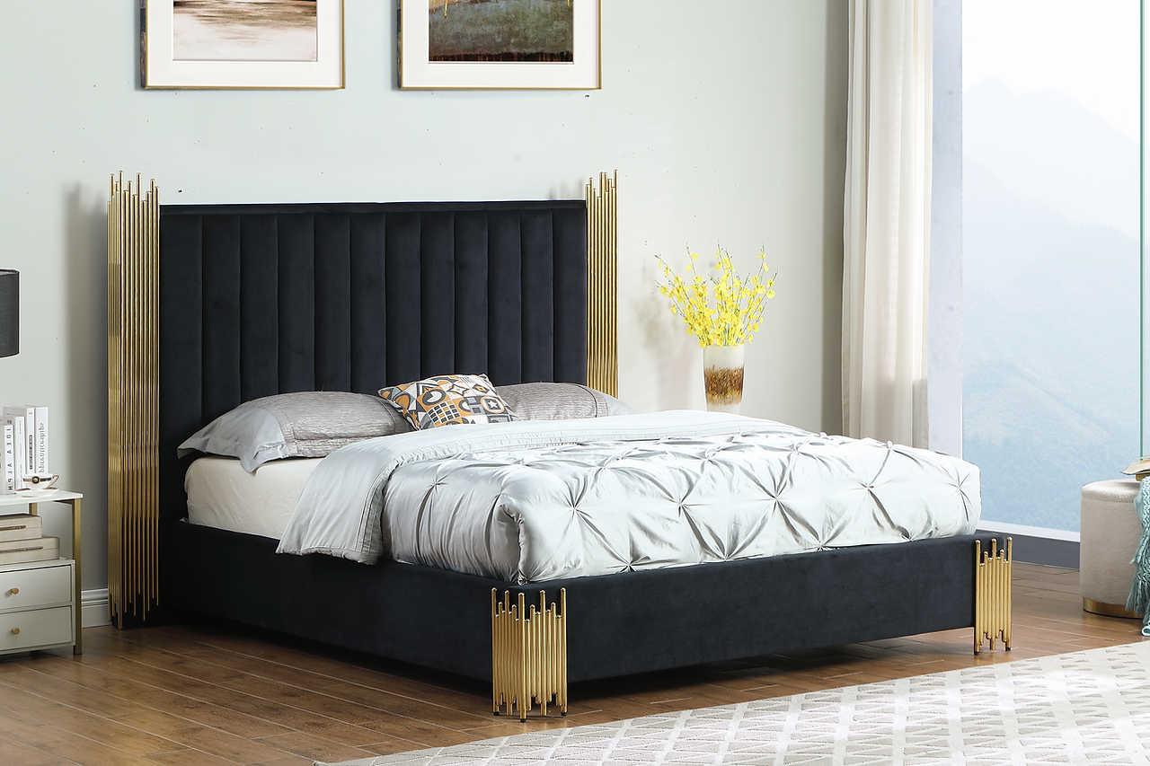 Close-up of upholstered black panel headboard with shelf