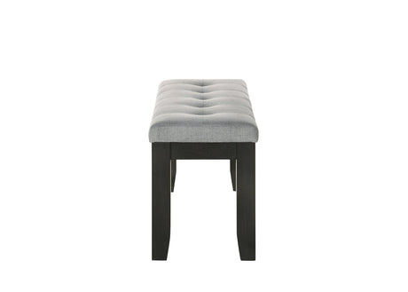 Detail of tufted fabric upholstery and wood finish on Bardstown dining chairs