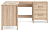 Workspace setup on Battelle tan home office desk