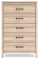 Battelle Tan Chest of Drawers in bedroom setting