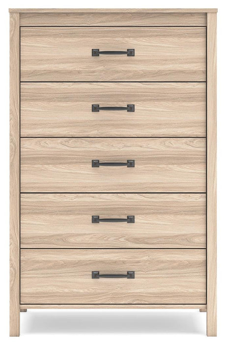 Battelle Tan Chest of Drawers in bedroom setting