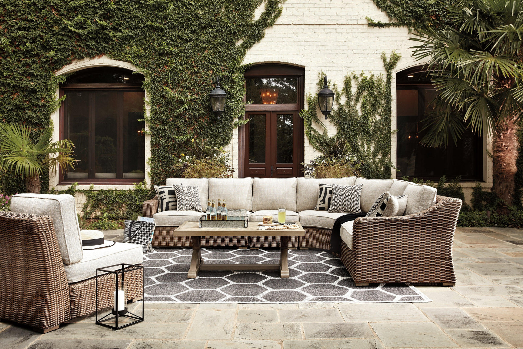 Beachcroft sectional set arranged in outdoor patio