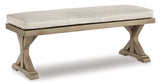 Outdoor Dining Table with bench and four chairs arranged on patio
