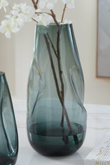 Close-up of teal blue glass vase texture