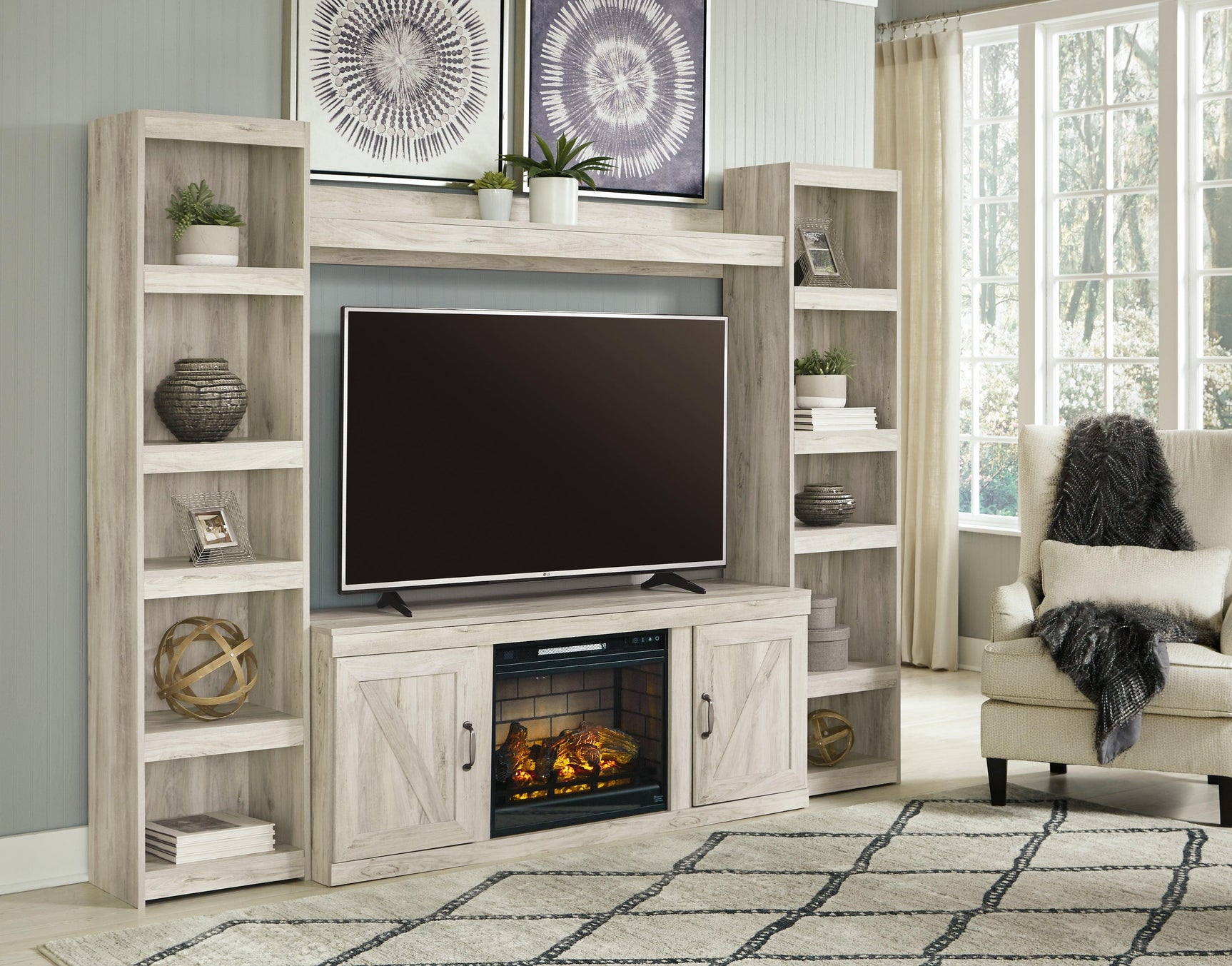 Bellaby Whitewash 4-Piece Entertainment Center side angle