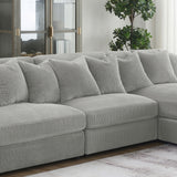 Side view of Blaine Upholstered Armless Chair in fog