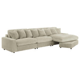 Room setting featuring Blaine Upholstered Reversible Sectional Sofa Set and Armless Chair