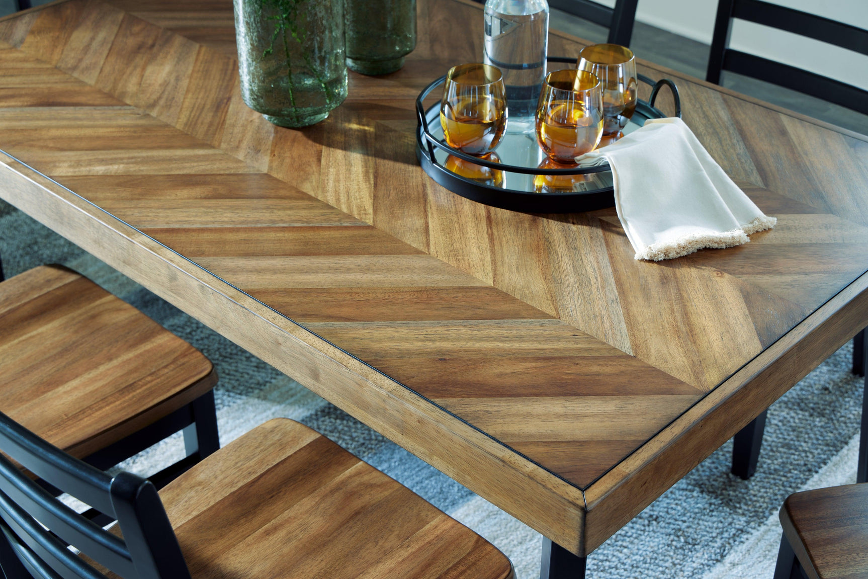 Black tapered legs of the Blondon dining table