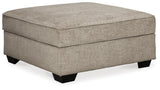 Living room view with Bovarian Stone sectional sofa and ottoman
