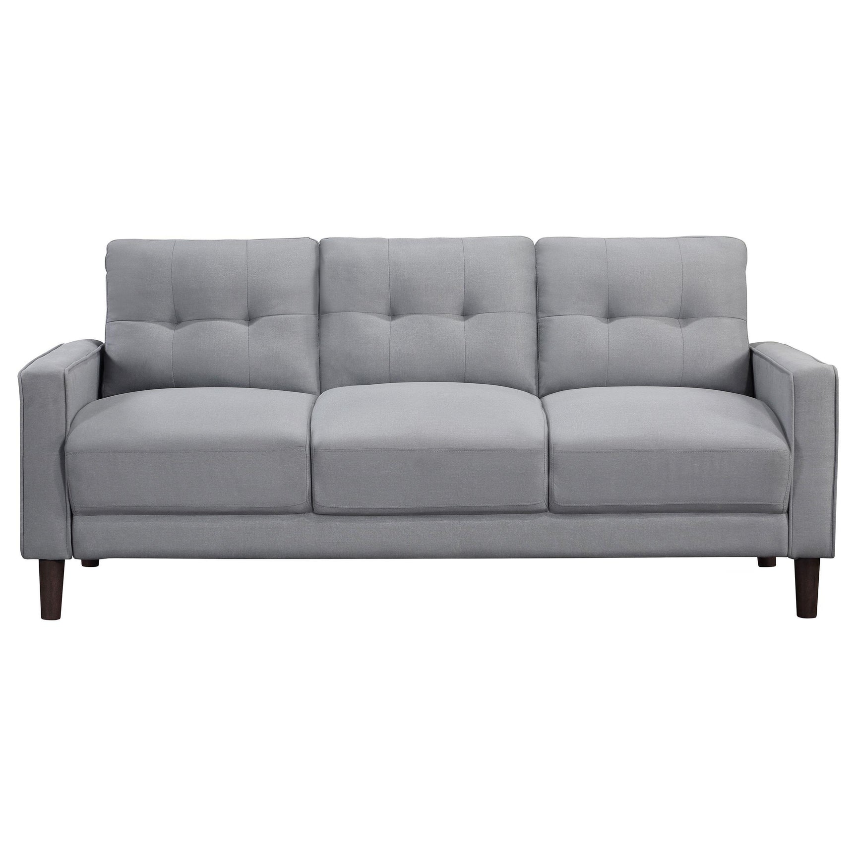 Close-up detail of tufted fabric and track arms on Bowen sofa set