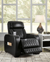 reclining view of Boyington Black Leather Power Recliner recliner